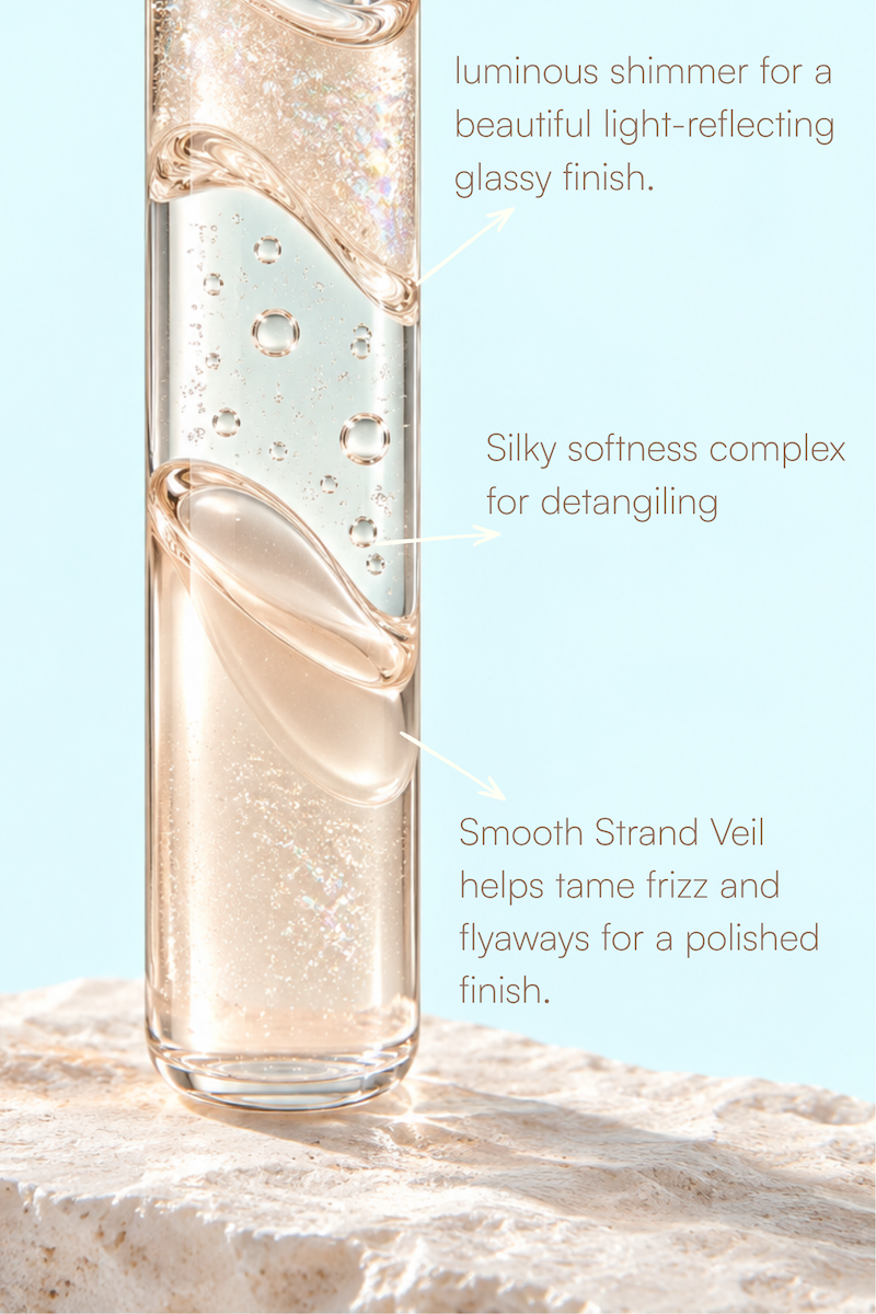 Gloss Drops serum in a glass tube, showing luminous shimmer, silky softness complex and Smooth Strand Veil for frizz control
