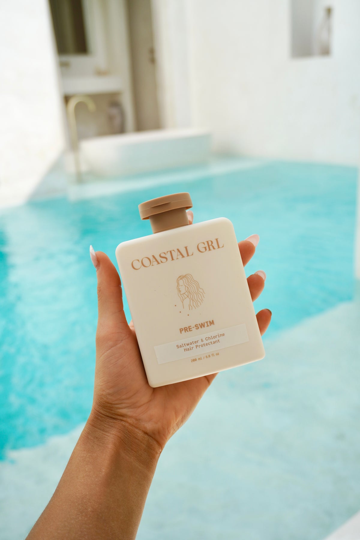 Coastal GRL pre-swim hair protection bottle