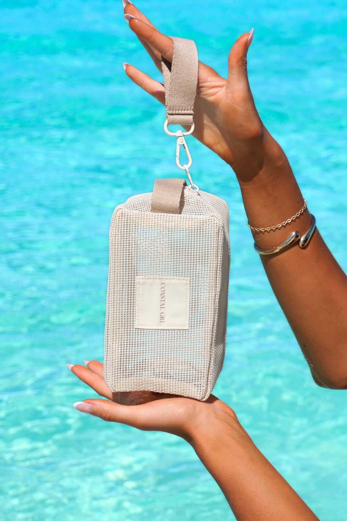 coastal grls bag being held